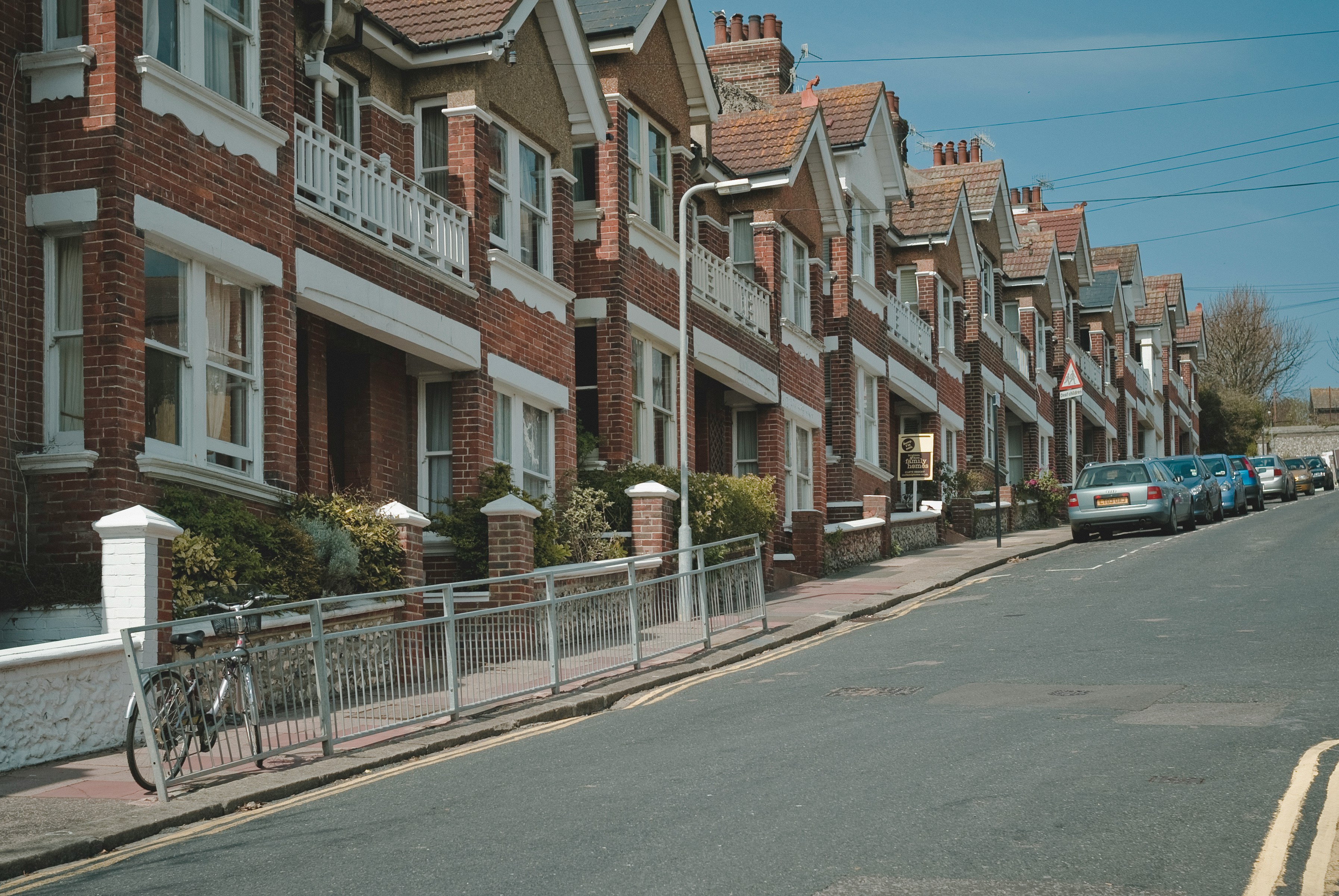 Private English residential street where off-market property deals are sourced through direct agent relationships